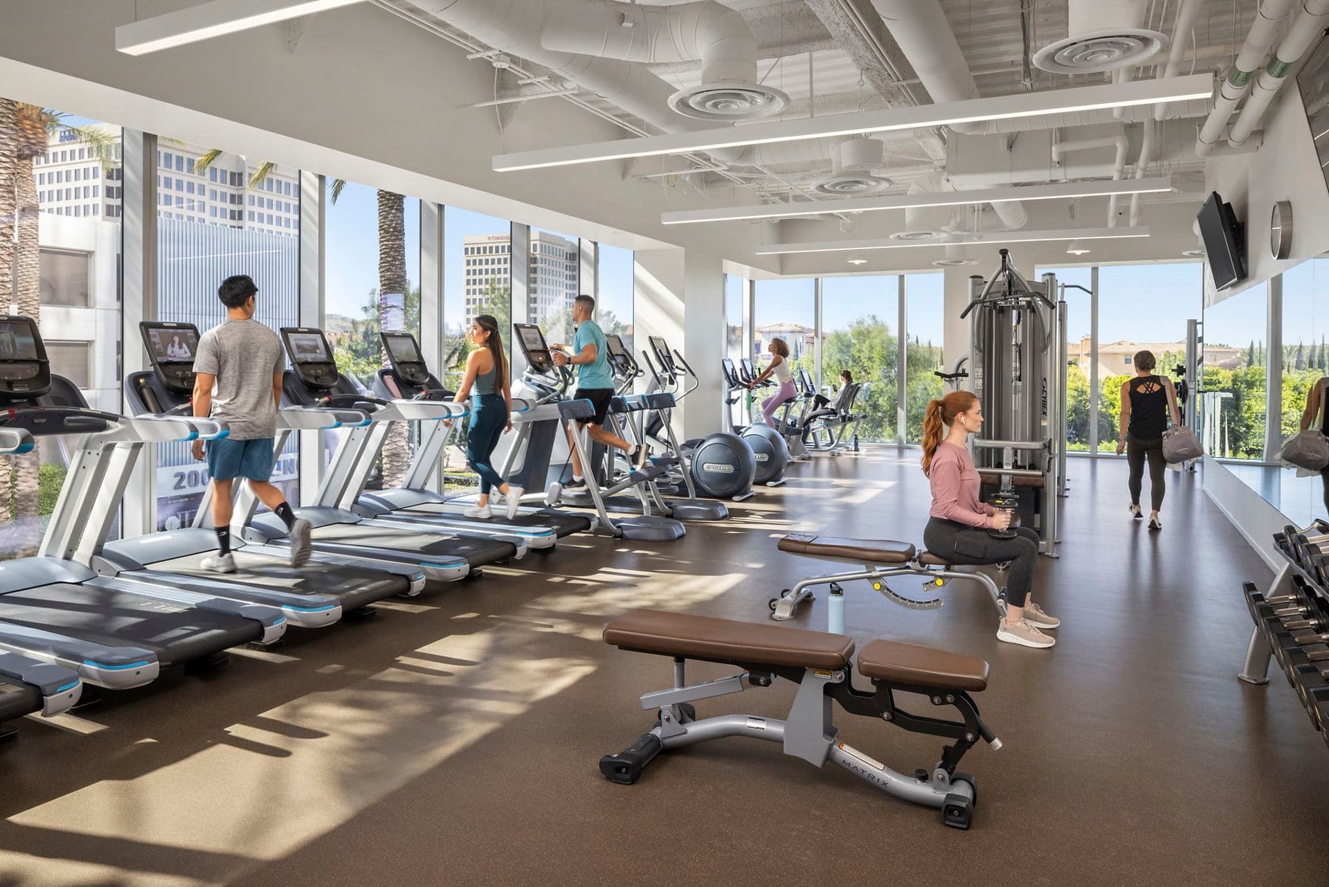 Interior lifestyle photography of Kinetic Fitness center at 200 Spectrum Center Drive in Irvine, CA.