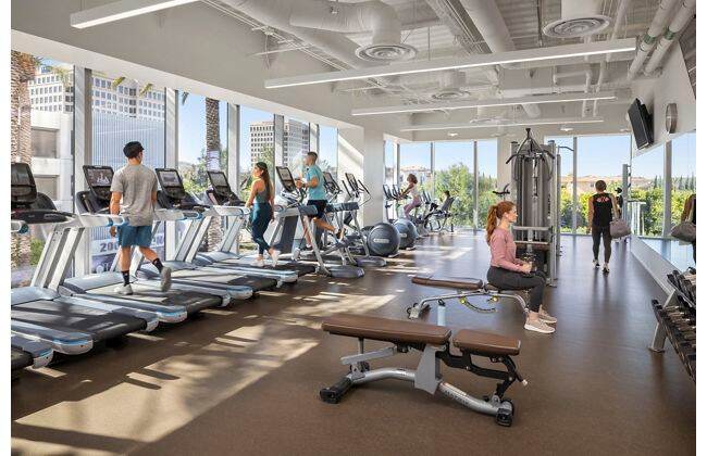 Interior lifestyle photography of Kinetic Fitness center at 200 Spectrum Center Drive in Irvine, CA.