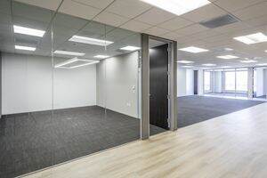 Interior view of Flex Workplace+ Suite 1170 in 300 Spectrum Center Drive in Irvine, CA.