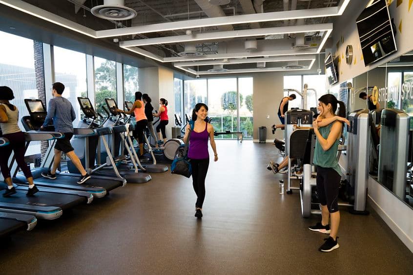 Lifestyle photography of KINETIC fitness center offering at 400 Spectrum Center, Irvine, Ca