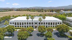 Exterior view of the 15420 Laguna Canyon Road office building at Discovery Park in Irvine, CA.