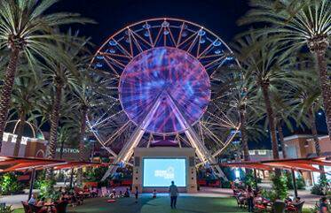 Evening view of the Giant Wheel Court at Irvine Spectrum Center in Irvine, CA.
