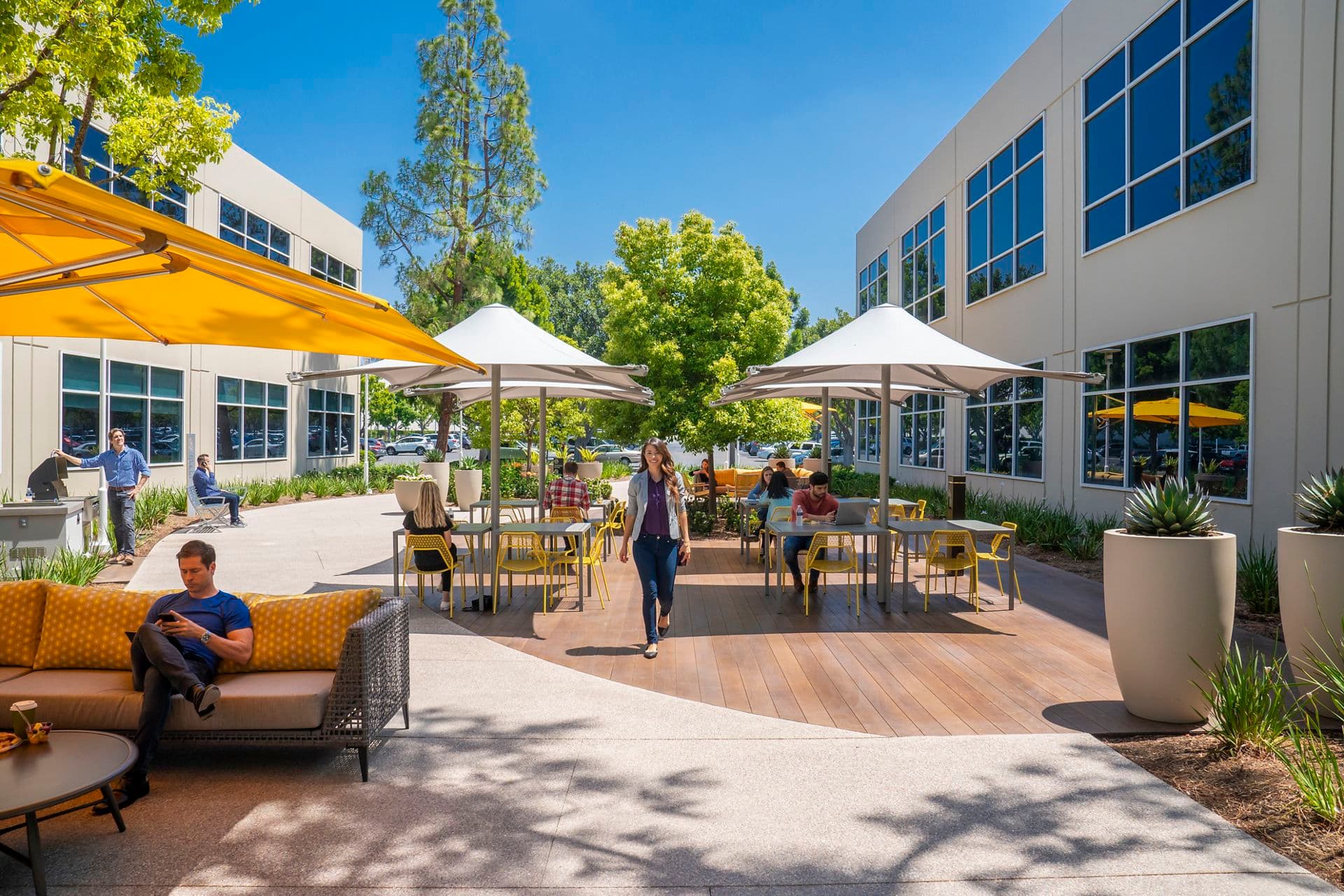 Lifestyle photography of the outdoor workspace between 38 and 36 Technology at Lakeview Business Center in Irvine, CA