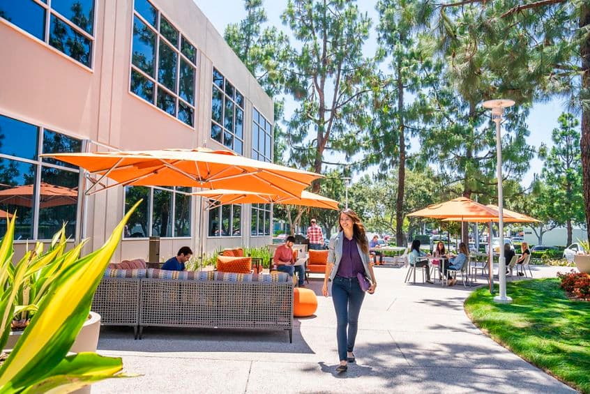 Lifestyle photography of the outdoor workspace between 1 and 3 Ada at Lakeview Business Center in Irvine, CA