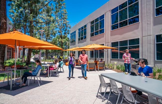 Lifestyle photography of the outdoor workspace between 1 and 3 Ada at Lakeview Business Center in Irvine, CA