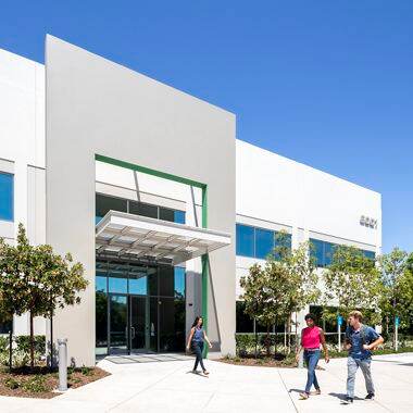 Lifestyle photography of the building entry at Oak Canyon Business Center - 6001 Oak Canyon in Irvine, CA