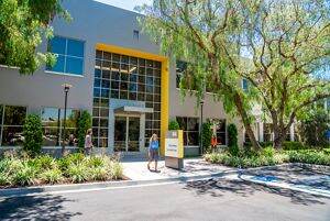Lifestyle photography of the building entry at Oak Creek Business Center - 6440 Oak Canyon in Irvine, CA