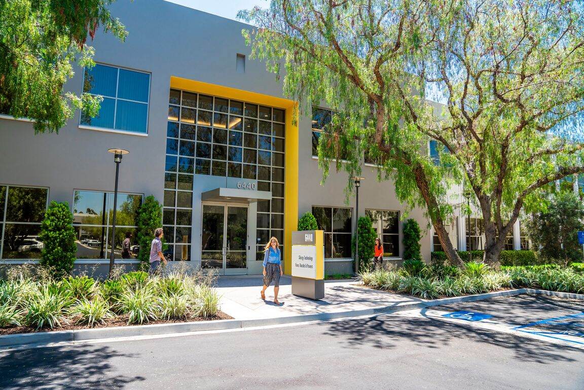 Lifestyle photography of the building entry at Oak Creek Business Center - 6440 Oak Canyon in Irvine, CA