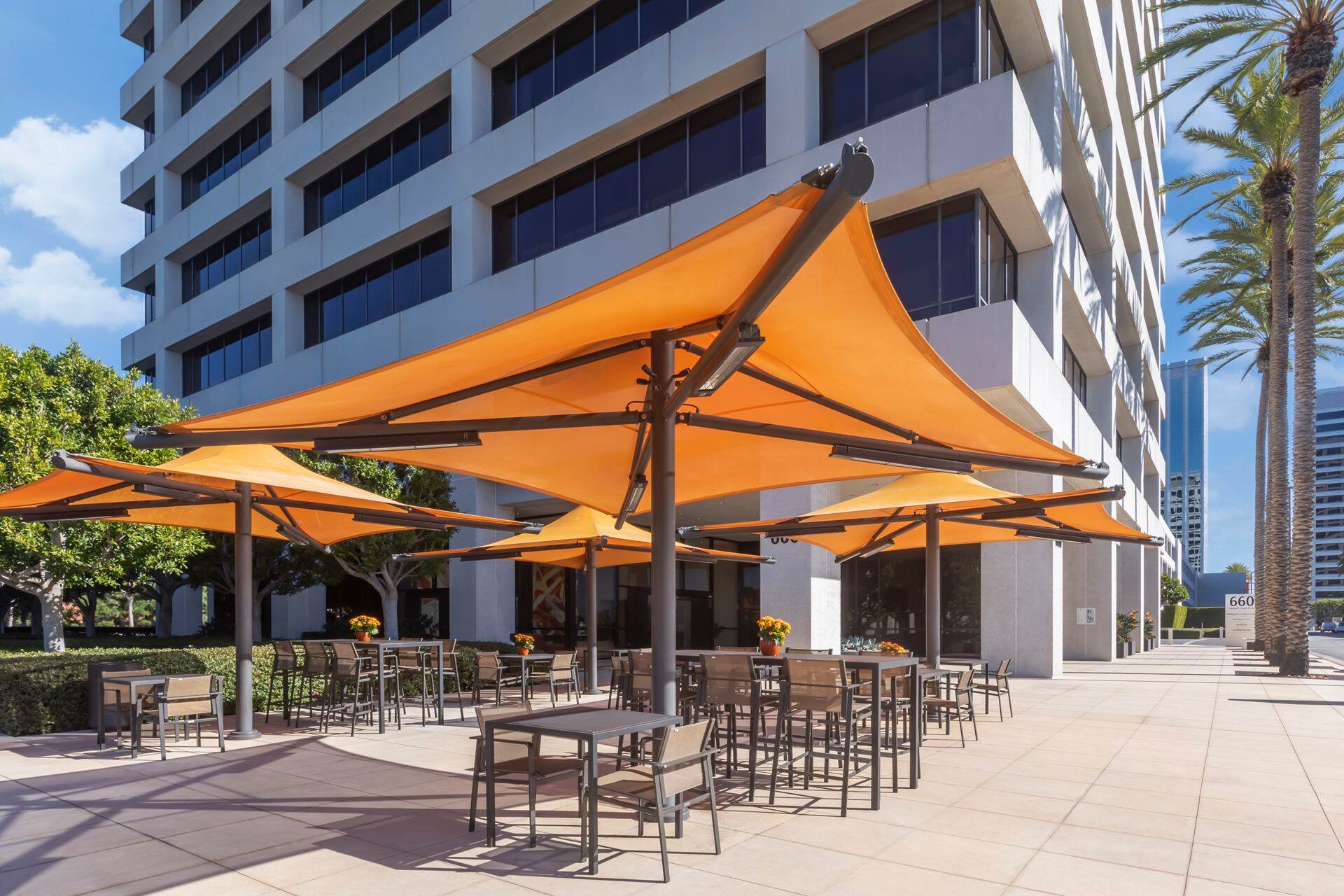 Exterior view of the outdoor workspace area at 680 Newport Center Drive in Newport Beach, CA.
