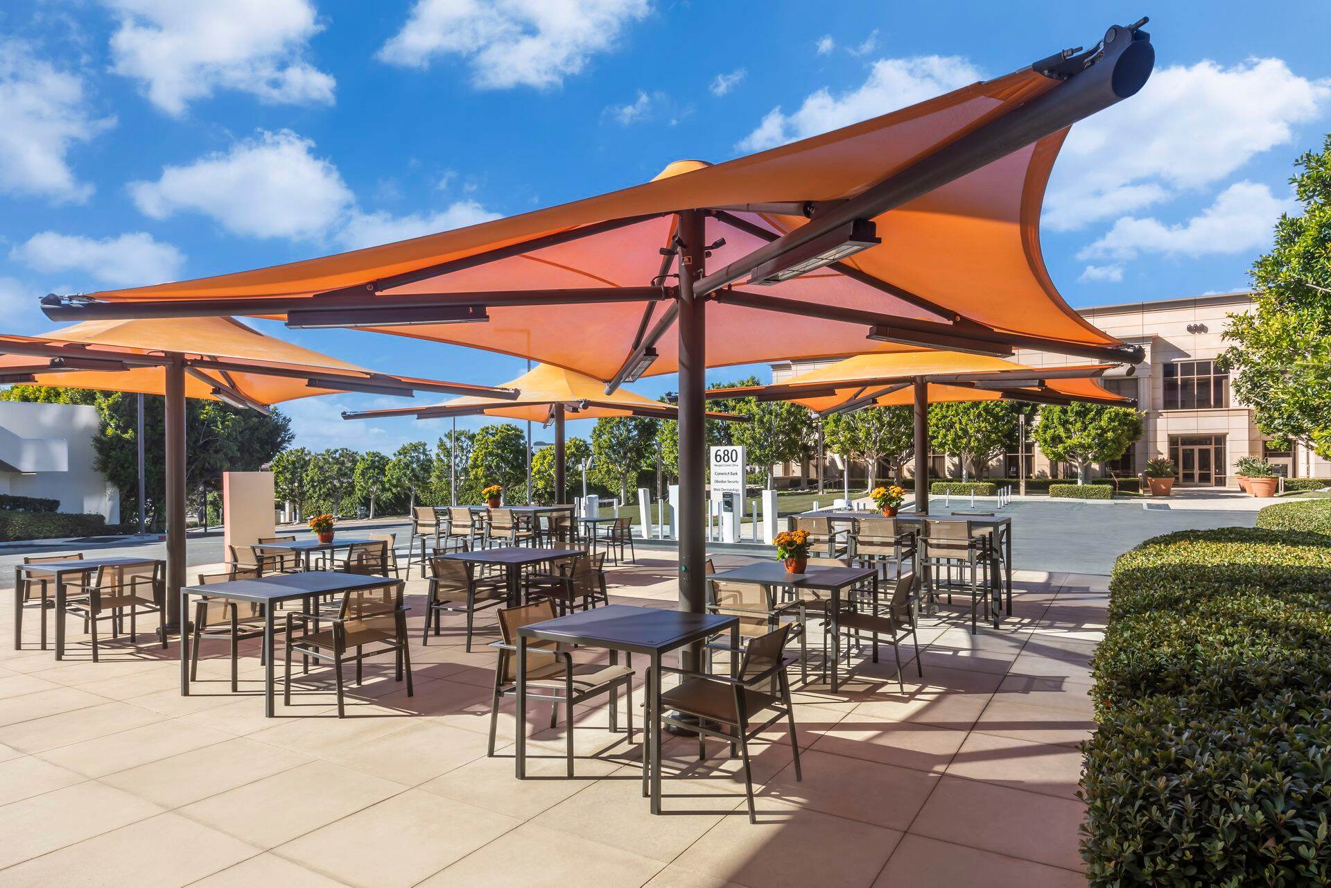 Exterior view of the outdoor workspace area at 680 Newport Center Drive in Newport Beach, CA.