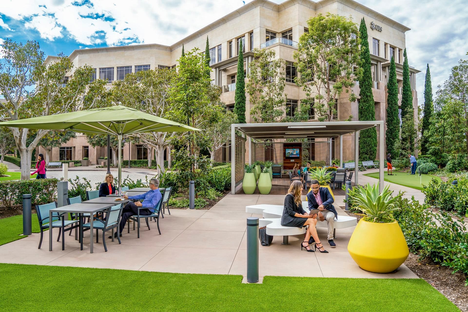 Exterior view of people at The Commons at 888 San Clemente Office Properties in Newport Beach, CA.