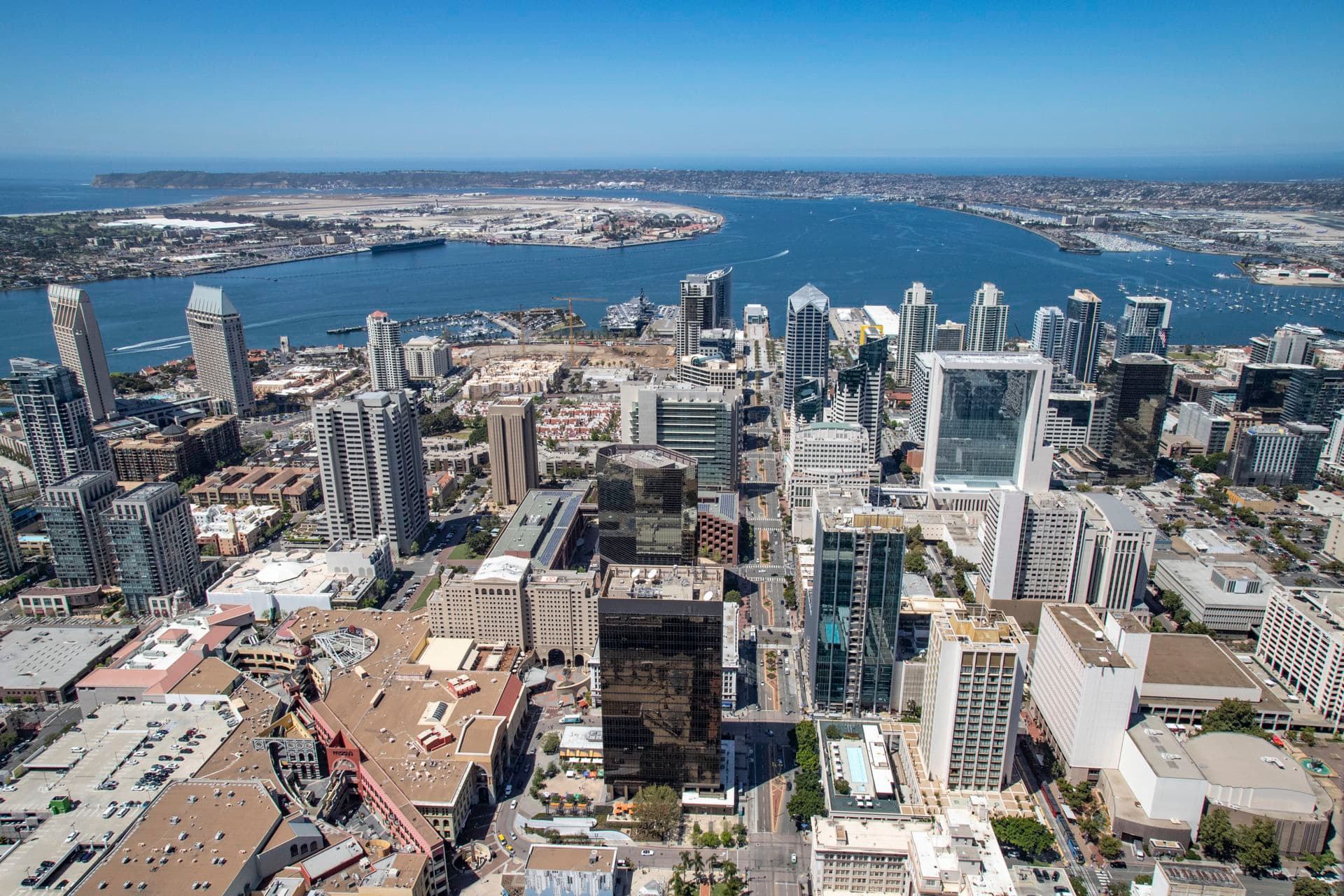 Aerial photography of downtown San Diego featuring 225 Broadway, 101 West Broadway, One America Plaza, and 501 West Broadway in San Diego, CA