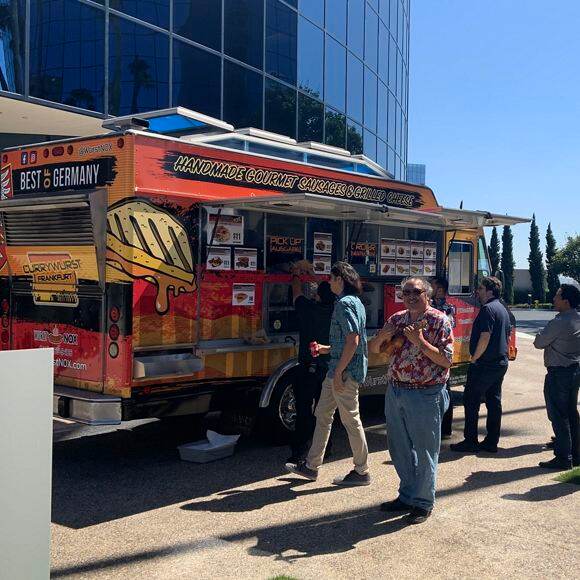 Photography of customers ordering from Currywurst Frankfurt Food Truck at La Jolla Center in San Diego, CA