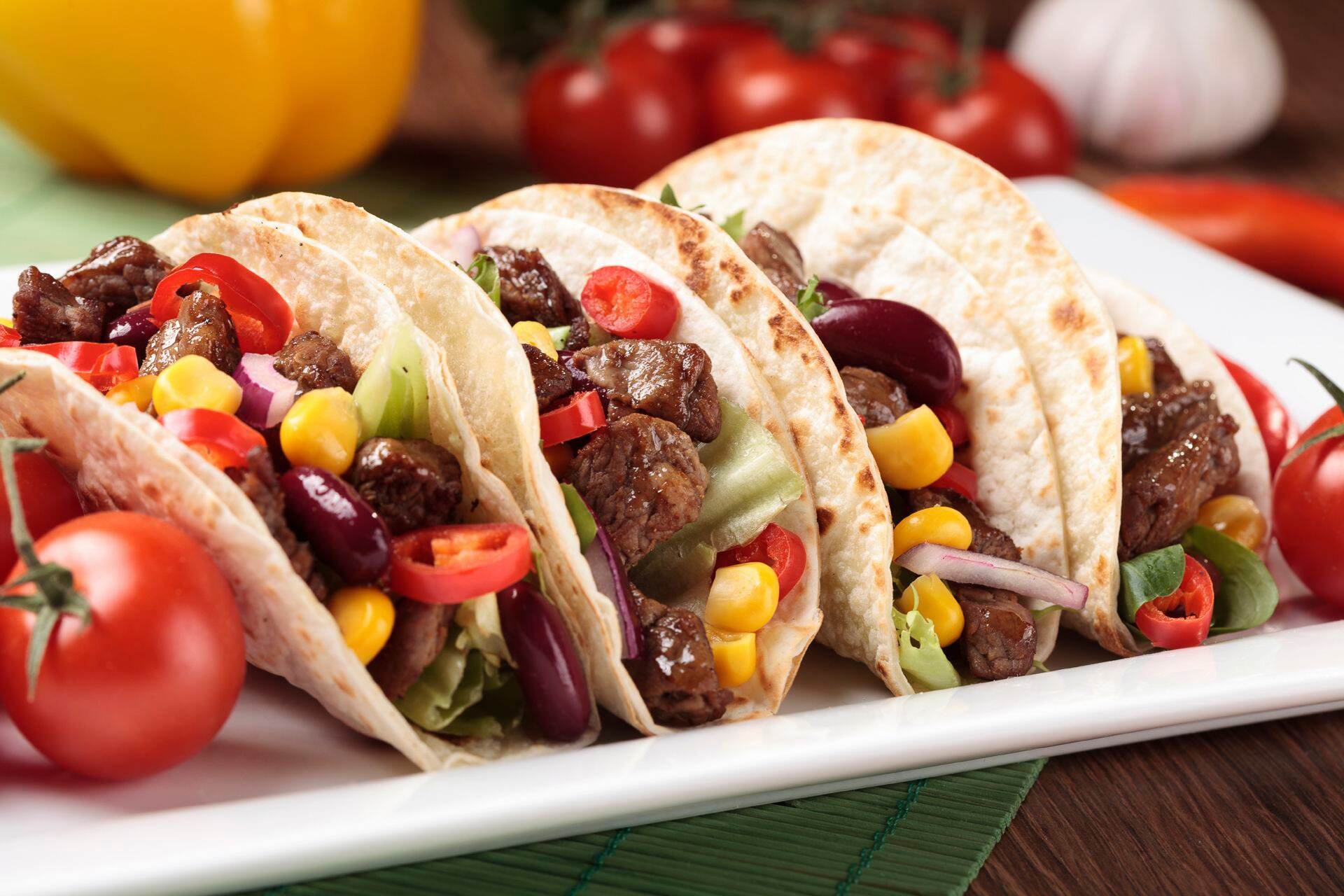 Serving taco with beef and vegetables