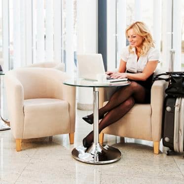Business woman sitting in a hotel lobby with her suitcase and using her laptop. 

[url=http://www.istockphoto.com/search/lightbox/9786622][img]http://dl.dropbox.com/u/40117171/business.jpg[/img][/url]
